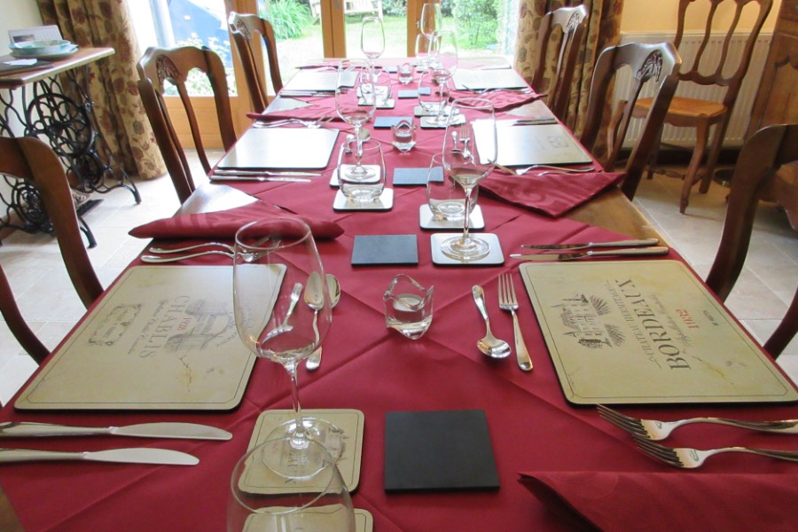 Breakfast room table ready for evening meal